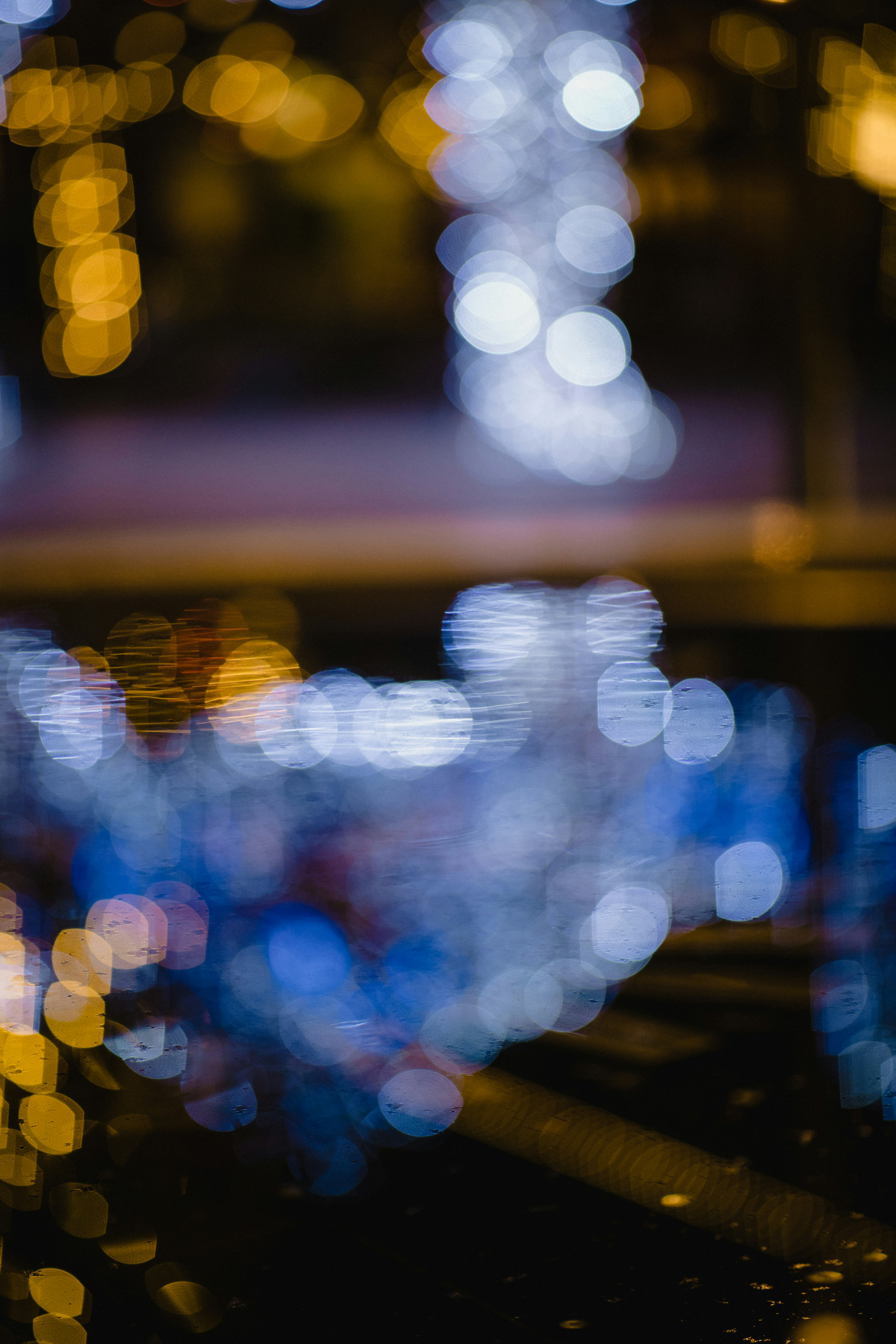 reflection of blue lights on body of water